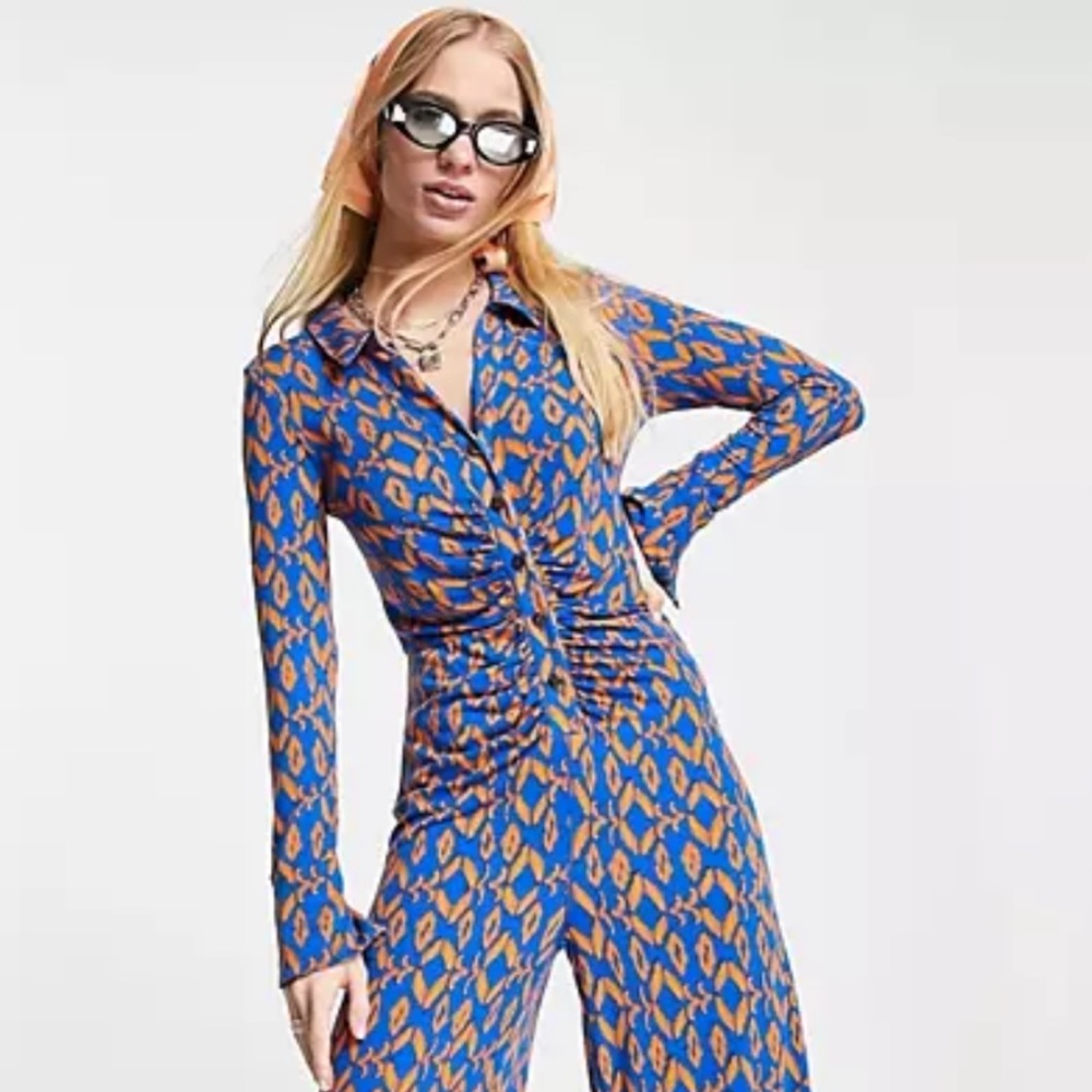 NWT Free People bluebell multi jumpsuit size XS
